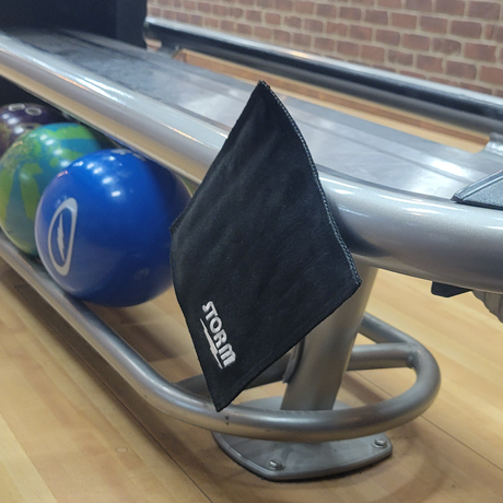 storm power shammy Removing oil from your bowling ball between each shot is critical to extending the performance and reaction.  Installed, is a powerful magnet that is protected inside which allows you to hang it directly on any metal scoring units at the bowling center by the bowling ball returns. The Power Shammy includes a double-sided leather pad with an inner layer that helps absorb the oil from the lanes and maintain the performance of all your favorite Storm bowling balls.